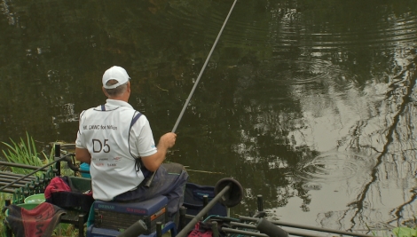Five-time World Champion Alan Scotthorne lands a small roach on day 1
